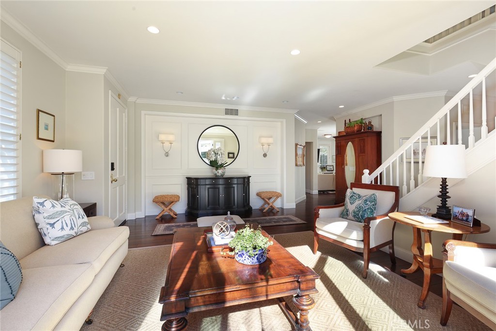 9 Chaminade Newport Coast, CA 92657 - Photo 5 of 29 a living room with furniture and a wooden floor