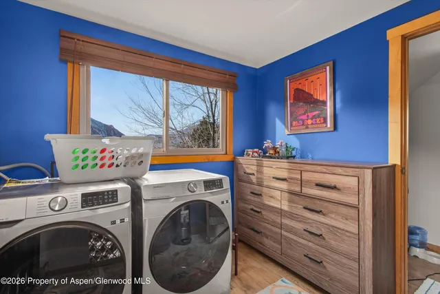 a utility room with dryer and washer