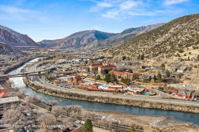 a view of a city with a lake