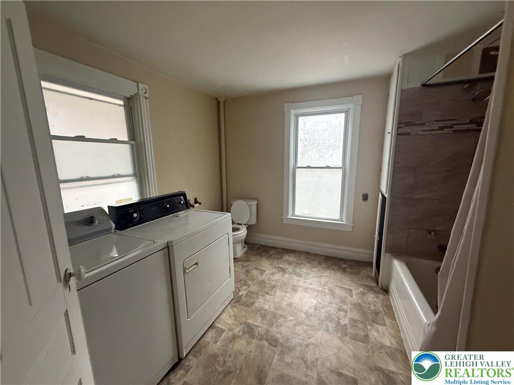 3714 Old Mill Road Slatington, PA 18080 - Photo 16 of 18 a room with window and dryer