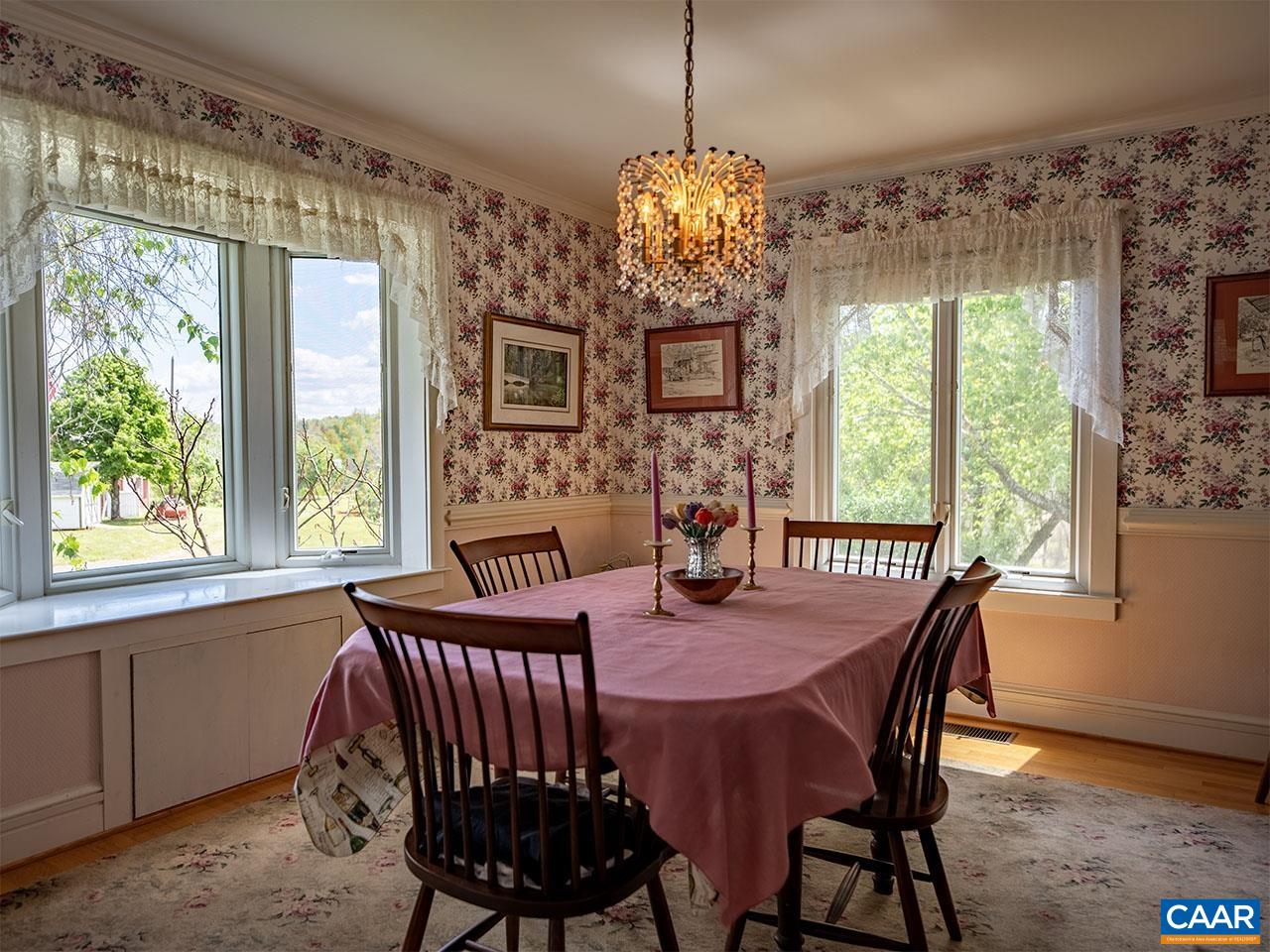 7230 Plank Road Afton, VA 22920 - Photo 11 of 37 a view of a dining room with furniture window and outside view