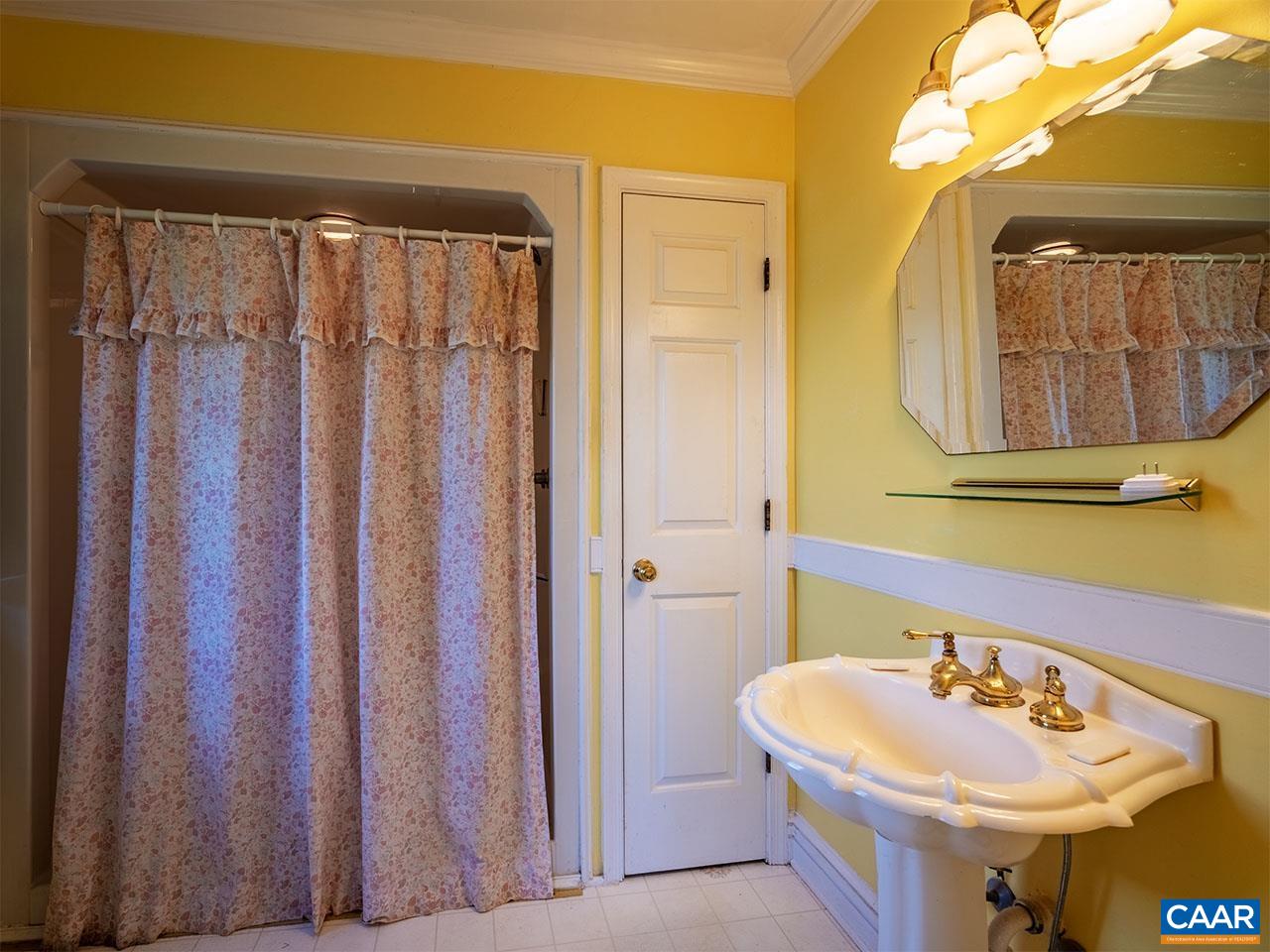 7230 Plank Road Afton, VA 22920 - Photo 18 of 37 a bathroom with a sink and a mirror