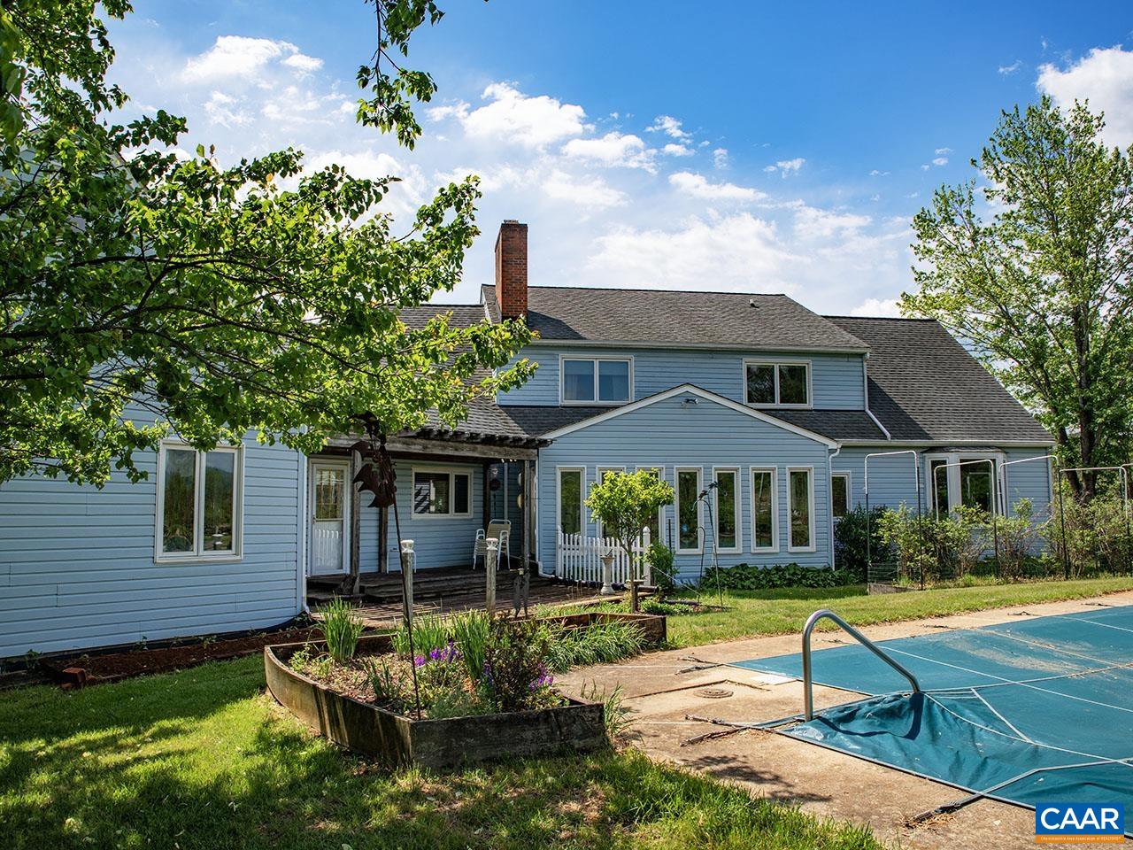 7230 Plank Road Afton, VA 22920 - Photo 2 of 37 a front view of a house with swimming pool having outdoor seating