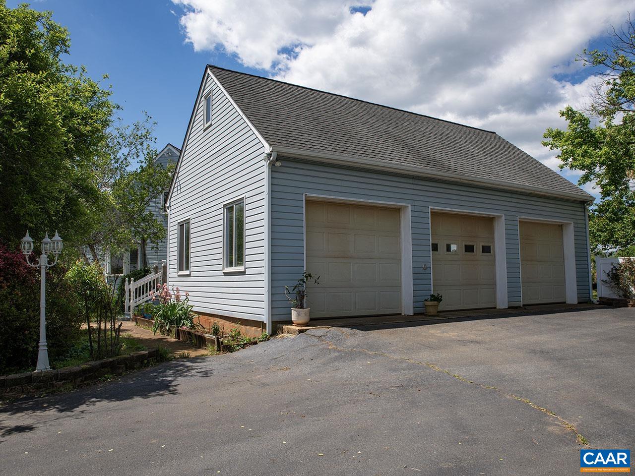 7230 Plank Road Afton, VA 22920 - Photo 22 of 37 a front view of a house with a garage