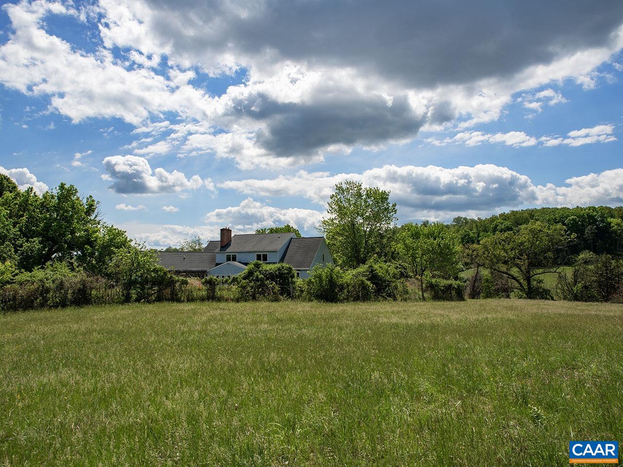 7230 Plank Road Afton, VA 22920 - Photo 23 of 37 a view of a garden with a building in the background