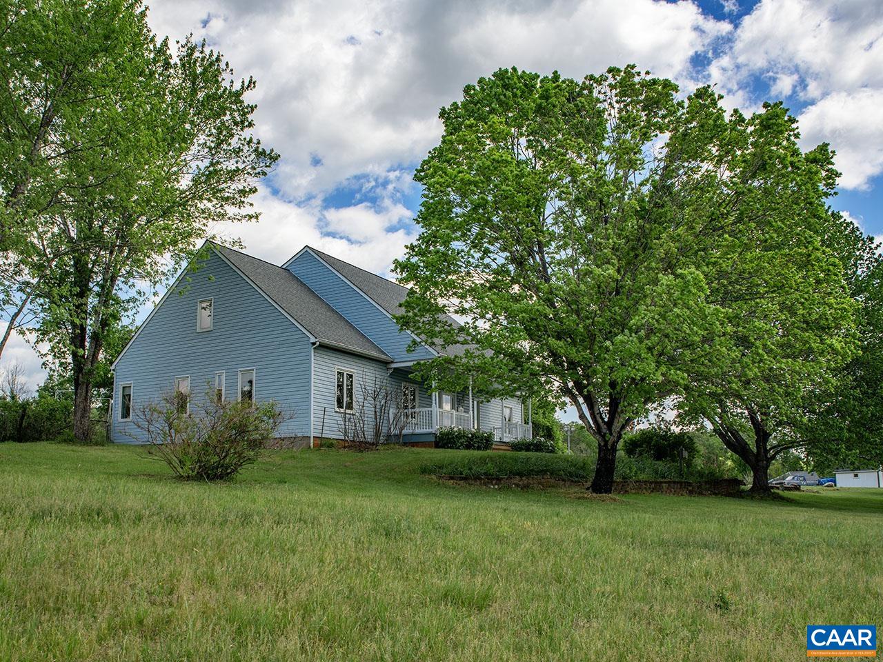 7230 Plank Road Afton, VA 22920 - Photo 37 of 37 a backyard of a house with lots of green space