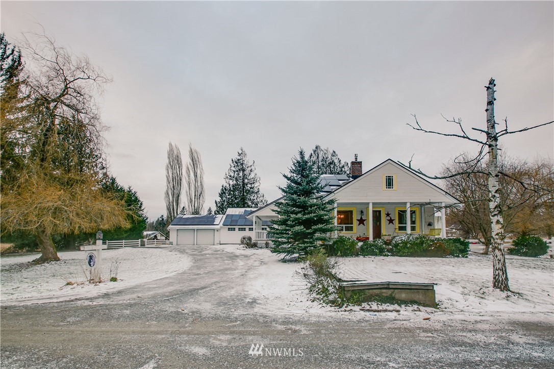 1000 Bellinger Road Bellingham, WA 98226 - Photo 2 of 40 a view of a house with a yard and hanging chair