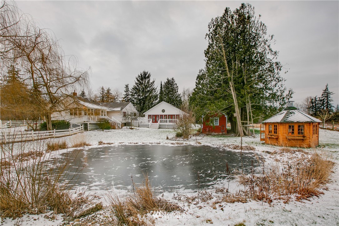 1000 Bellinger Road Bellingham, WA 98226 - Photo 25 of 40 a view of a town with large trees and barn in the background