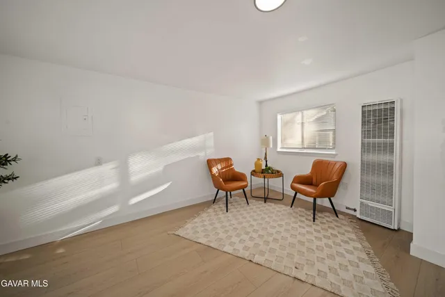 a kitchen with a sink cabinets and window