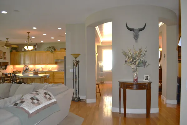 a view of a dining room with furniture window and wooden floor