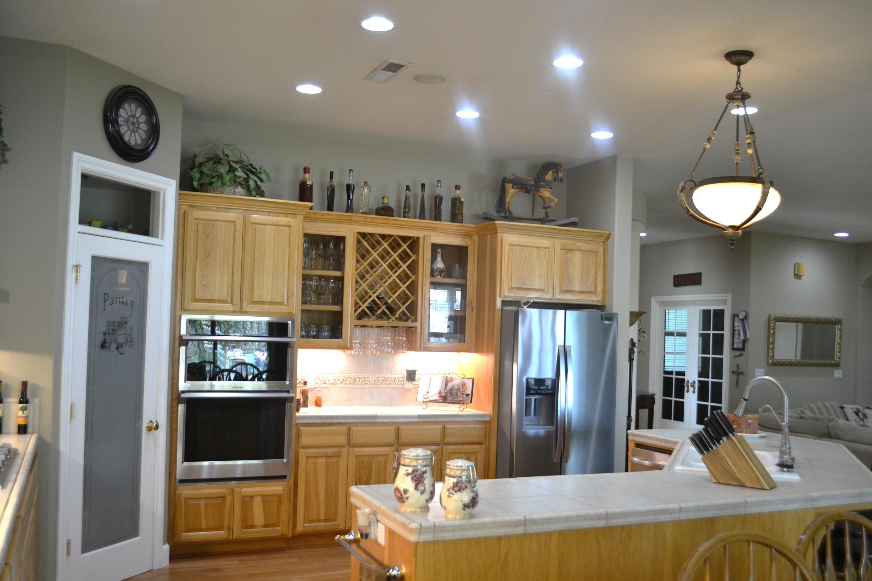 480-100 Belfast Road Litchfield, CA 96117 - Photo 24 of 100 a kitchen with stainless steel appliances granite countertop a refrigerator and microwave