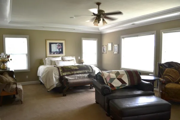 a view of a house with a yard and plants