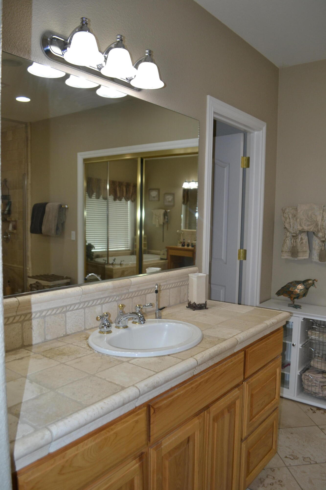 480-100 Belfast Road Litchfield, CA 96117 - Photo 39 of 100 a bathroom with a sink and a mirror