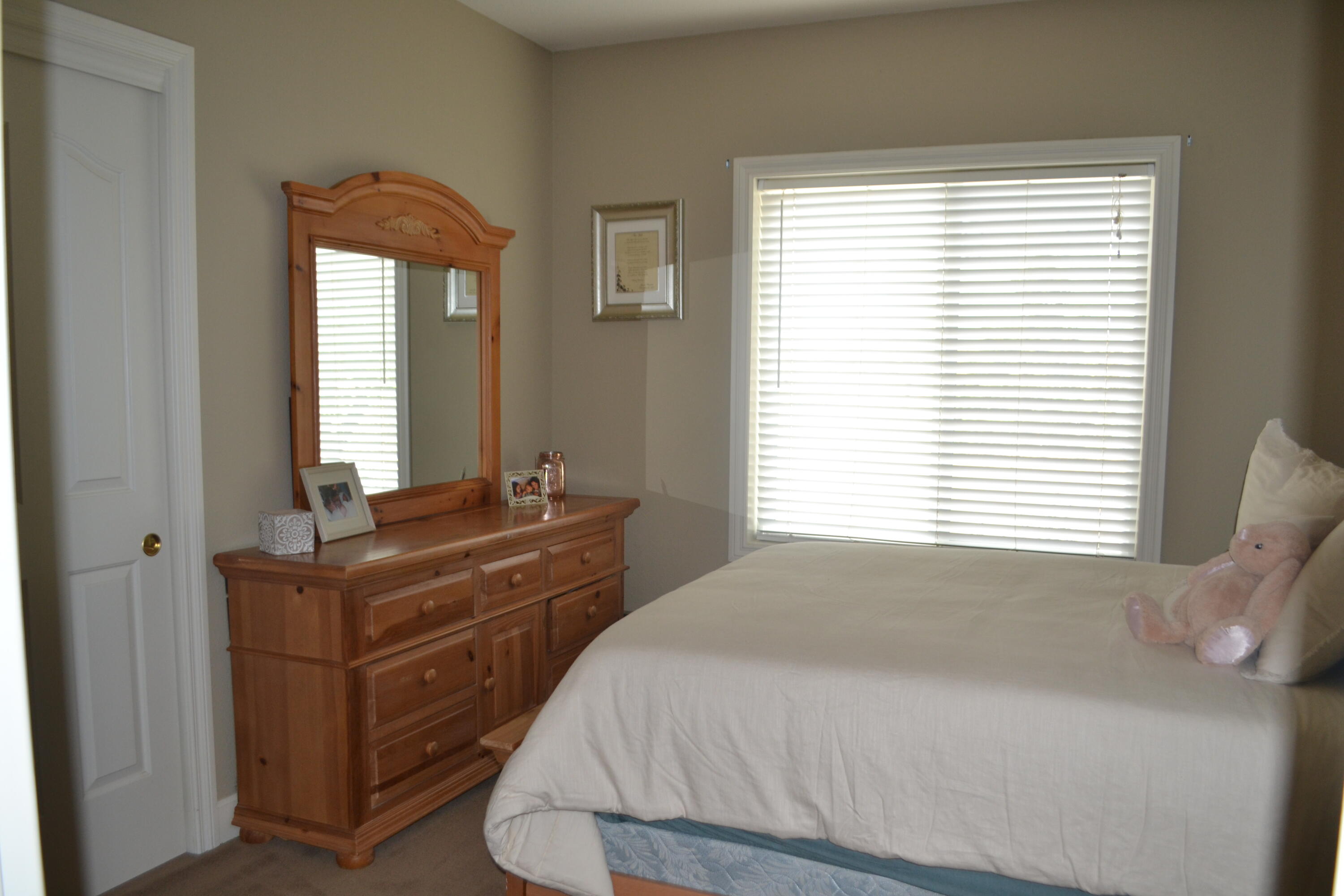 480-100 Belfast Road Litchfield, CA 96117 - Photo 47 of 100 a bedroom with a bed and windows