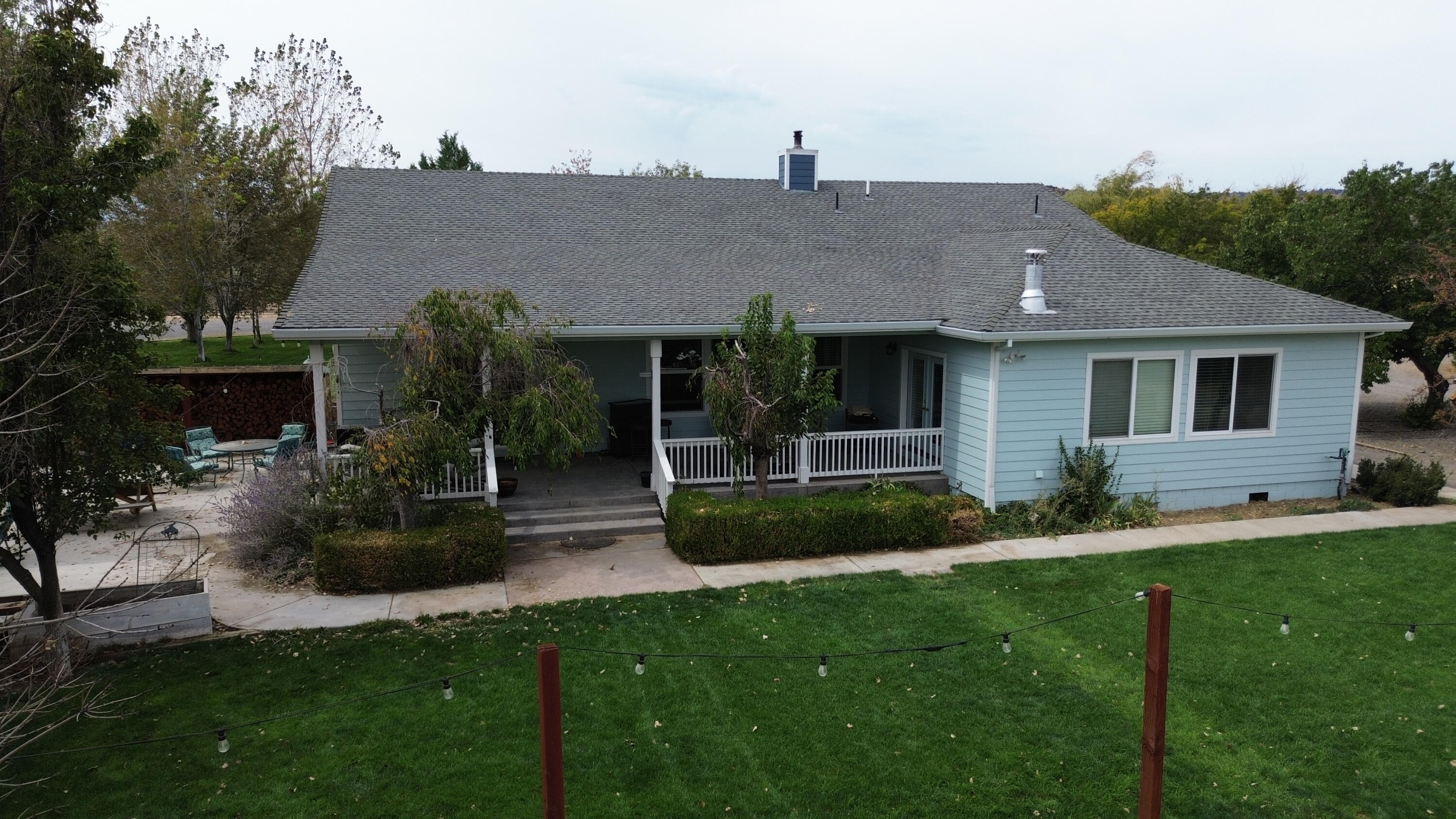 480-100 Belfast Road Litchfield, CA 96117 - Photo 63 of 100 a view of a house with a yard and plants