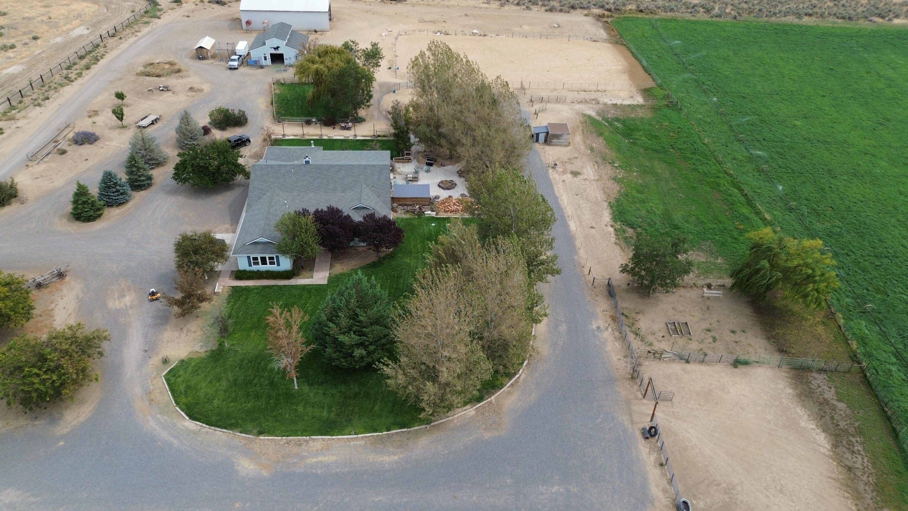 480-100 Belfast Road Litchfield, CA 96117 - Photo 75 of 100 an aerial view of a house with outdoor space and trees all around