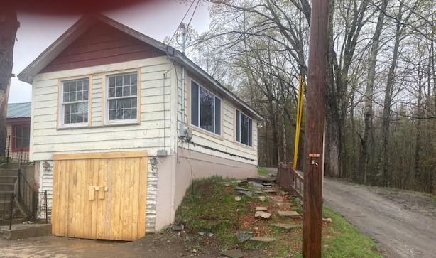 365 Dover Road Dexter, ME 04930 - Photo 3 of 19 front right side view of attached garage