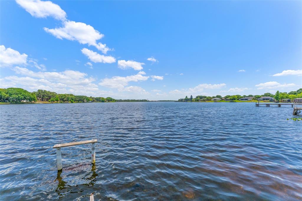 7558 Berkley Road Polk City, FL 33868 - Photo 2 of 16 a view of a lake