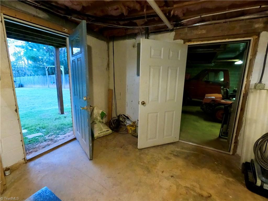 1850 Cromer Road King, NC 27021 - Photo 36 of 49 Doors to outside (L) and to second car garage on right