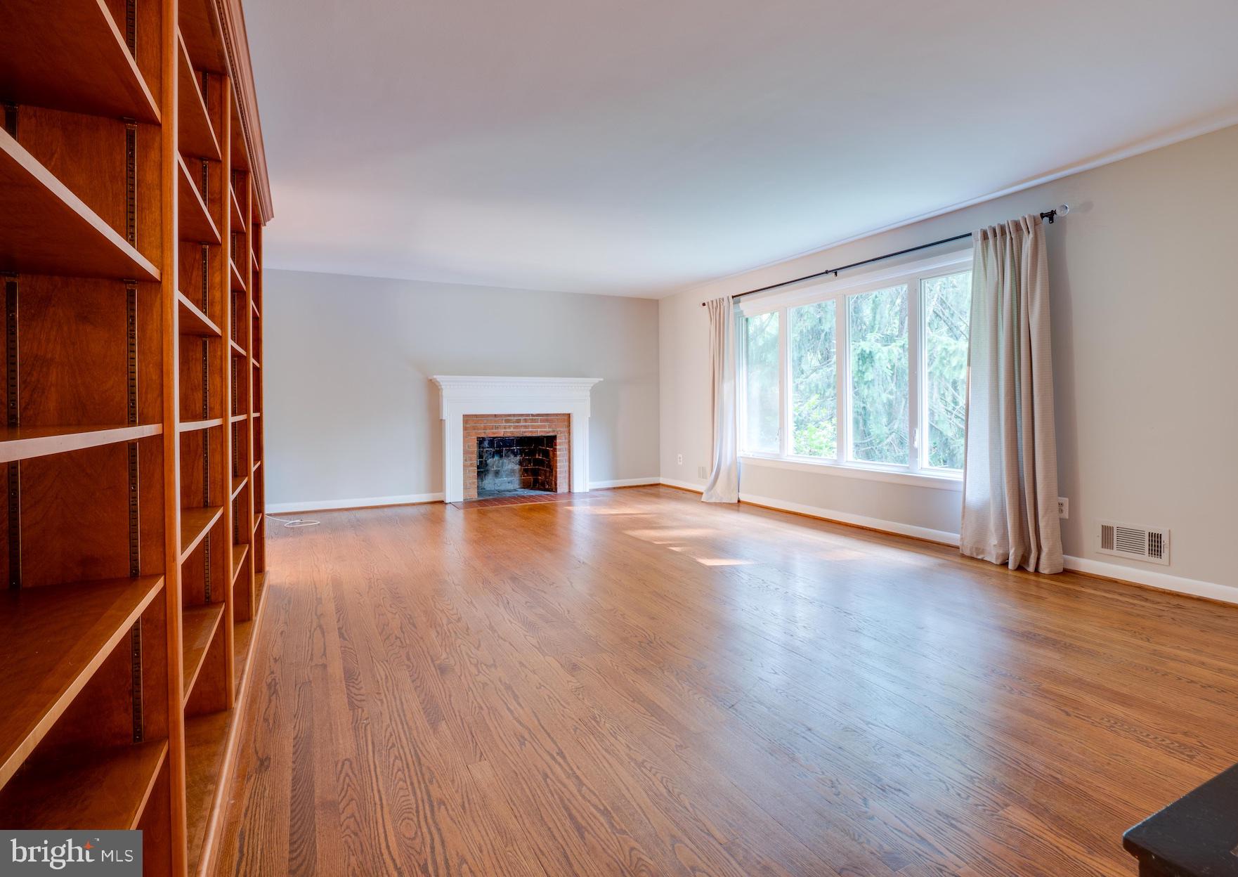 3725 Military Road Arlington, VA 22207 - Photo 5 of 33 Formal living room w/fireplace, hardwood flooring