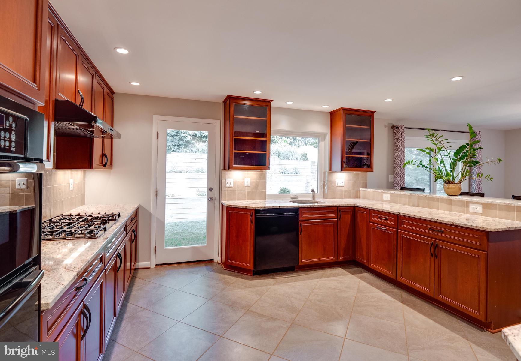 3725 Military Road Arlington, VA 22207 - Photo 9 of 33 Custom cabinetry, tile flooring