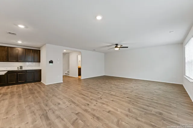 a view of a kitchen with a sink and dishwasher