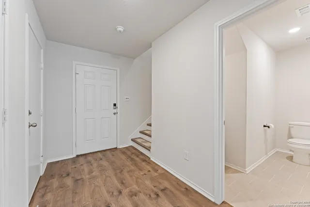 a view of a bathroom with toilet