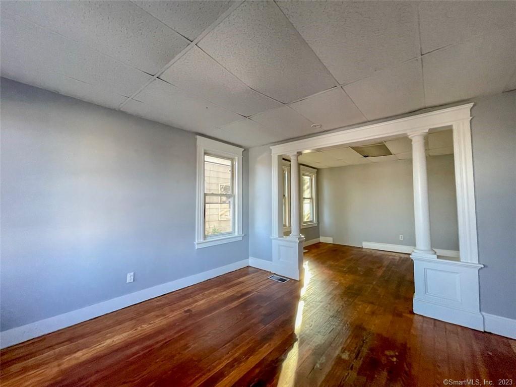 500 Wilson Street, Unit 1 Waterbury, CT 06708 - Photo 1 of 1 a view of an empty room and window