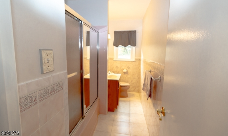 169 Valley View Road Hillside, NJ 07205 - Photo 18 of 32 a bathroom with a shower and a sink