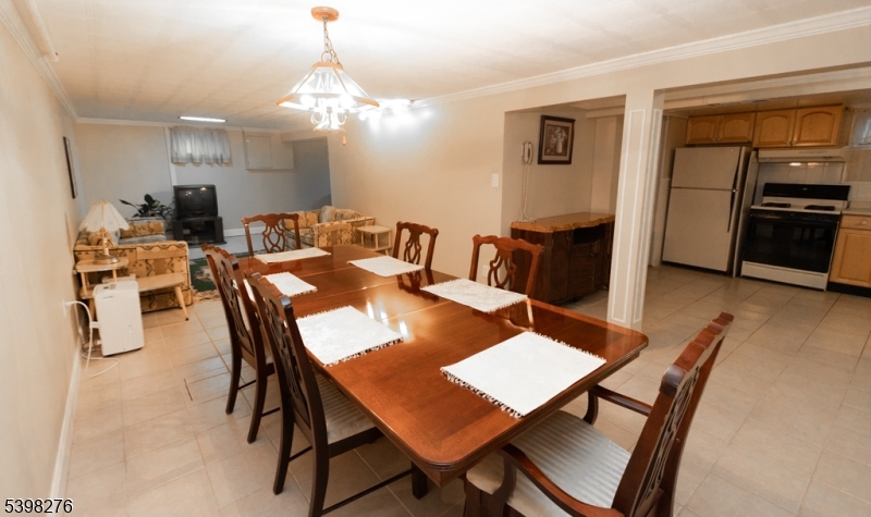 169 Valley View Road Hillside, NJ 07205 - Photo 23 of 32 a view of a dining room with furniture