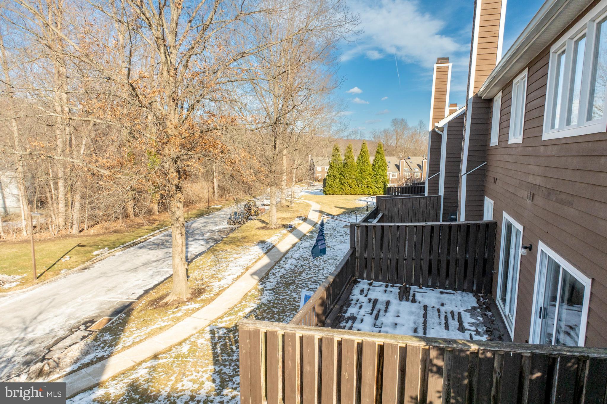281 Fox Run Exton, PA 19341 - Photo 4 of 42 a view of balcony with wooden floor and fence