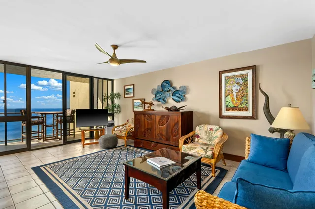 a living room with furniture a wooden floor and a table