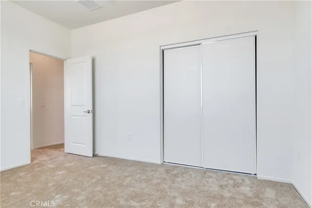 an empty room with closet