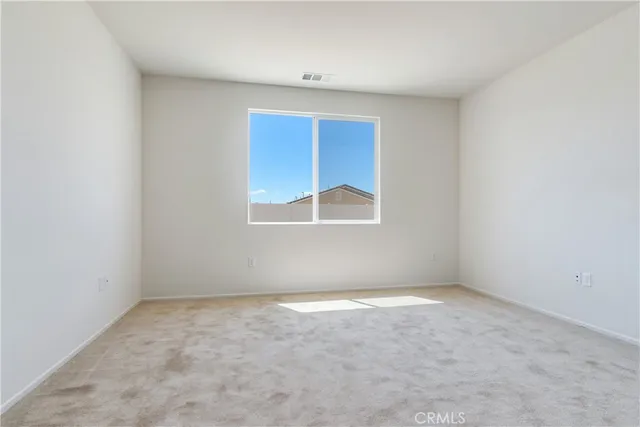 an empty room with a window