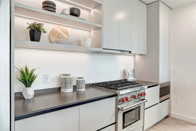 a view of a living room and hardwood floor