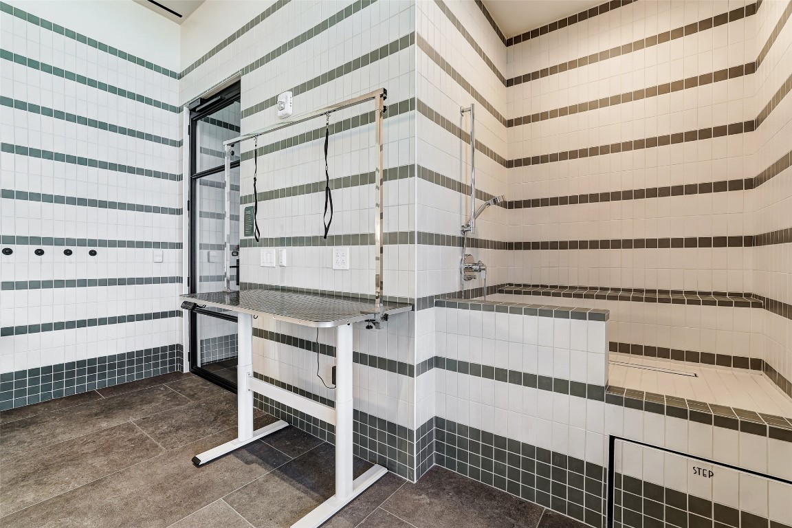 610 Davis Street, Unit 3008 Austin, TX 78701 - Photo 35 of 39 a view of a room with racks on the wall