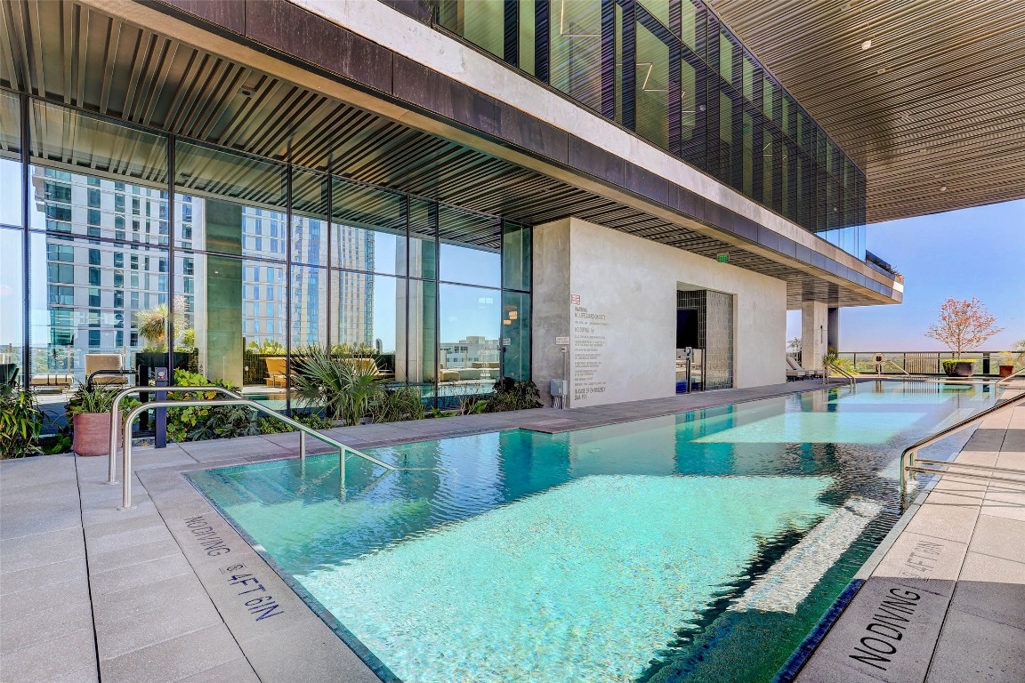 610 Davis Street, Unit 3008 Austin, TX 78701 - Photo 36 of 39 a view of a house with a backyard