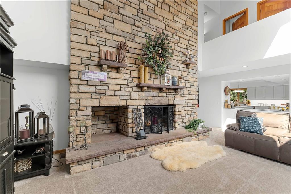 171 Mae West Road Confluence, PA 15424 - Photo 11 of 46 a living room with furniture and a fireplace