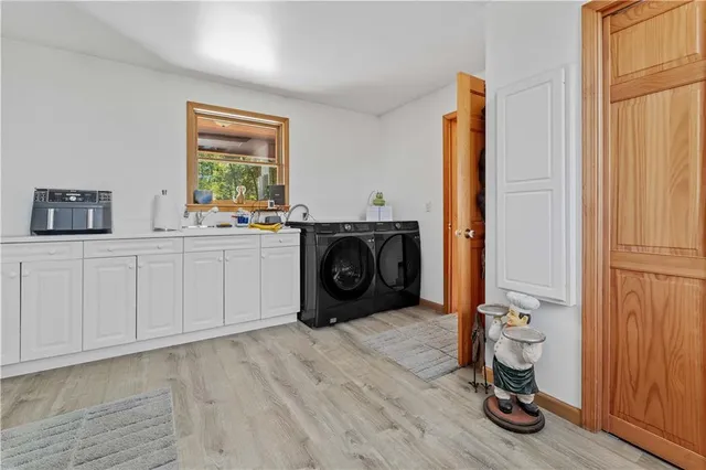 a room with a sink and a window