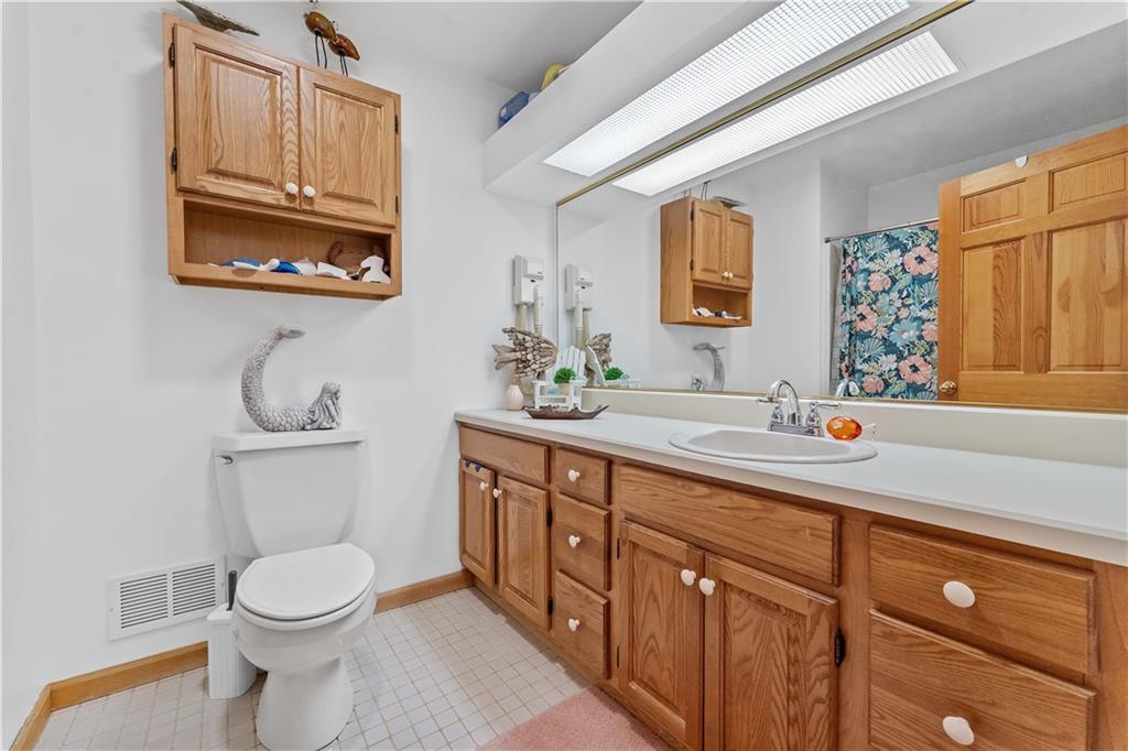 171 Mae West Road Confluence, PA 15424 - Photo 31 of 46 a bathroom with a toilet a sink and mirror
