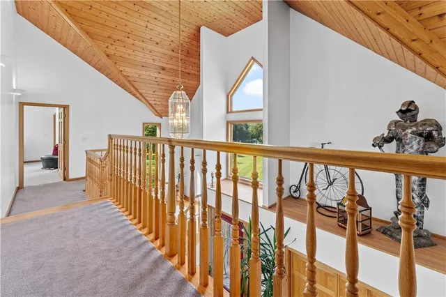 a view of a balcony with wooden floor
