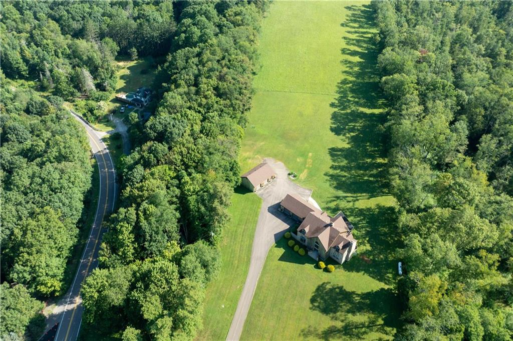 171 Mae West Road Confluence, PA 15424 - Photo 40 of 46 an aerial view of residential house with outdoor space and trees all around