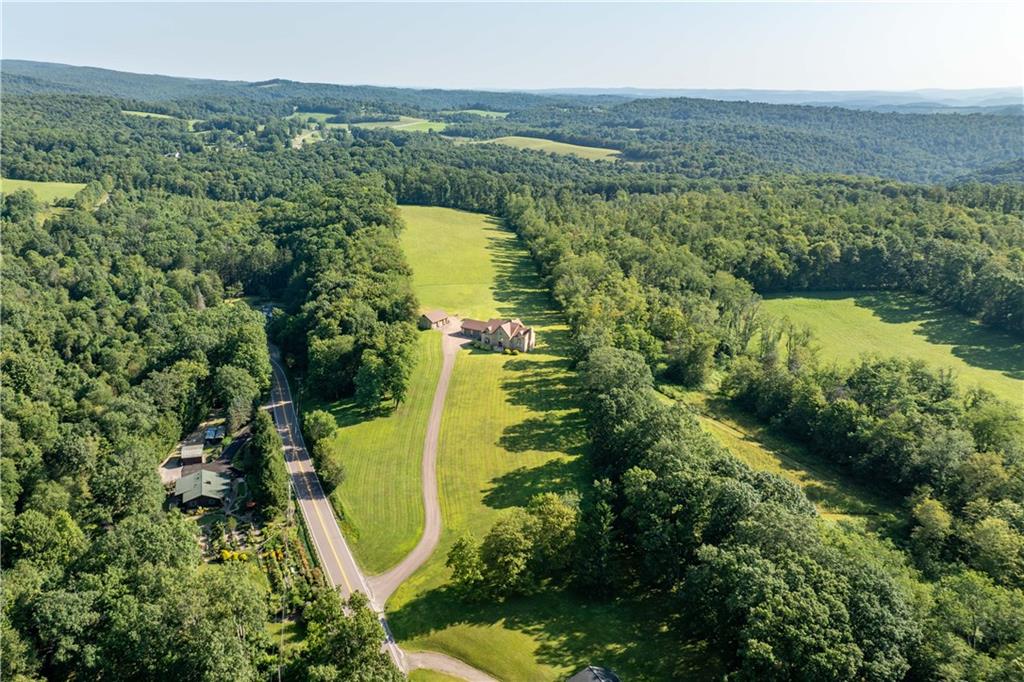 171 Mae West Road Confluence, PA 15424 - Photo 44 of 46 an aerial view of a residential house with an outdoor space and seating