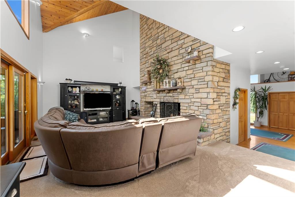 171 Mae West Road Confluence, PA 15424 - Photo 8 of 46 a living room with fireplace furniture and a flat screen tv