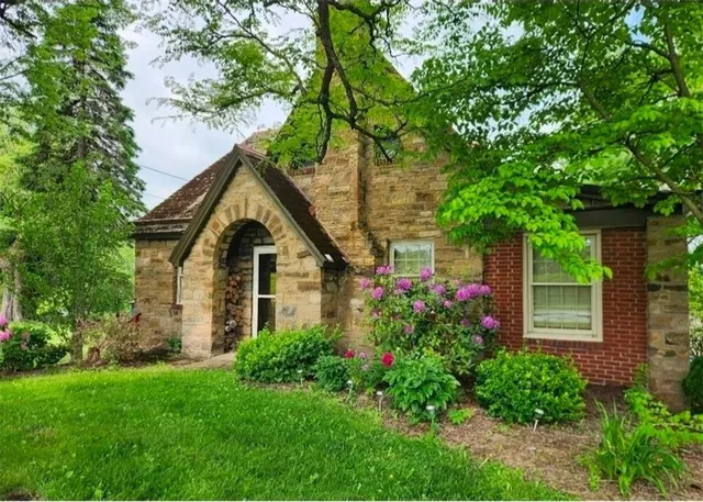 a house view with a garden