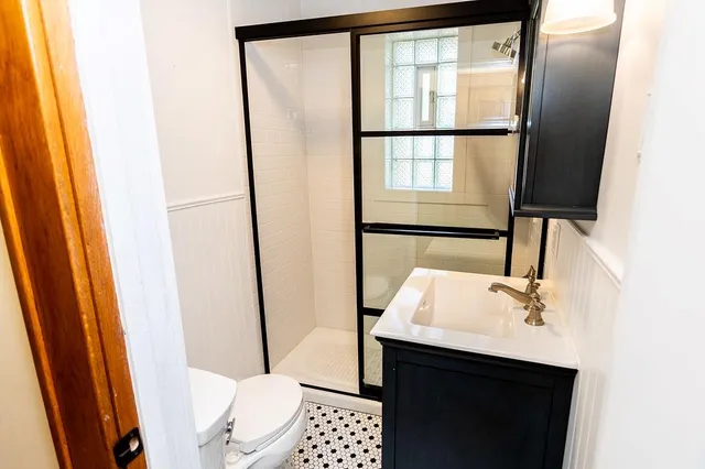 a view of balcony with wooden floor