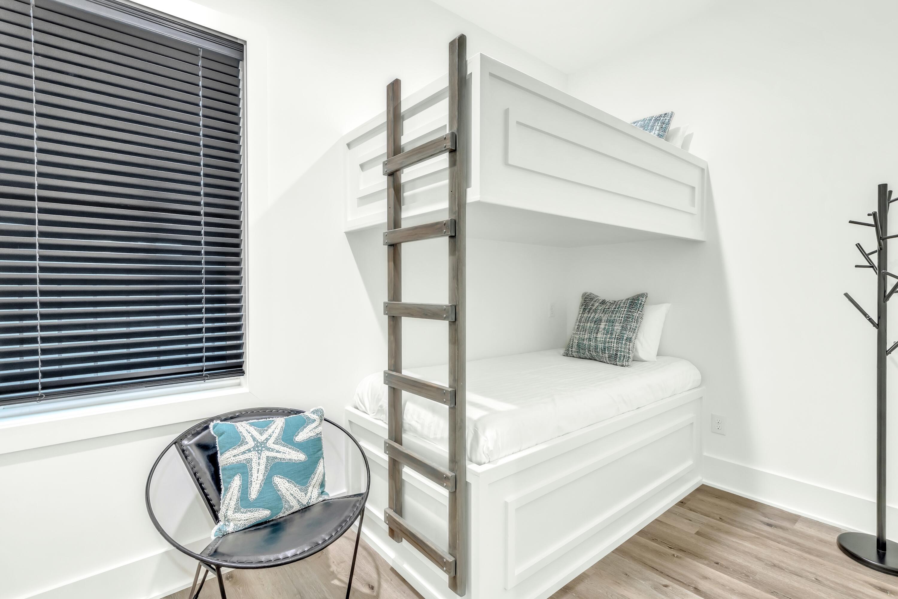 20 Sea Croft Drive Santa Rosa Beach, FL 32459 - Photo 13 of 54 a bedroom with a bed and wooden floor