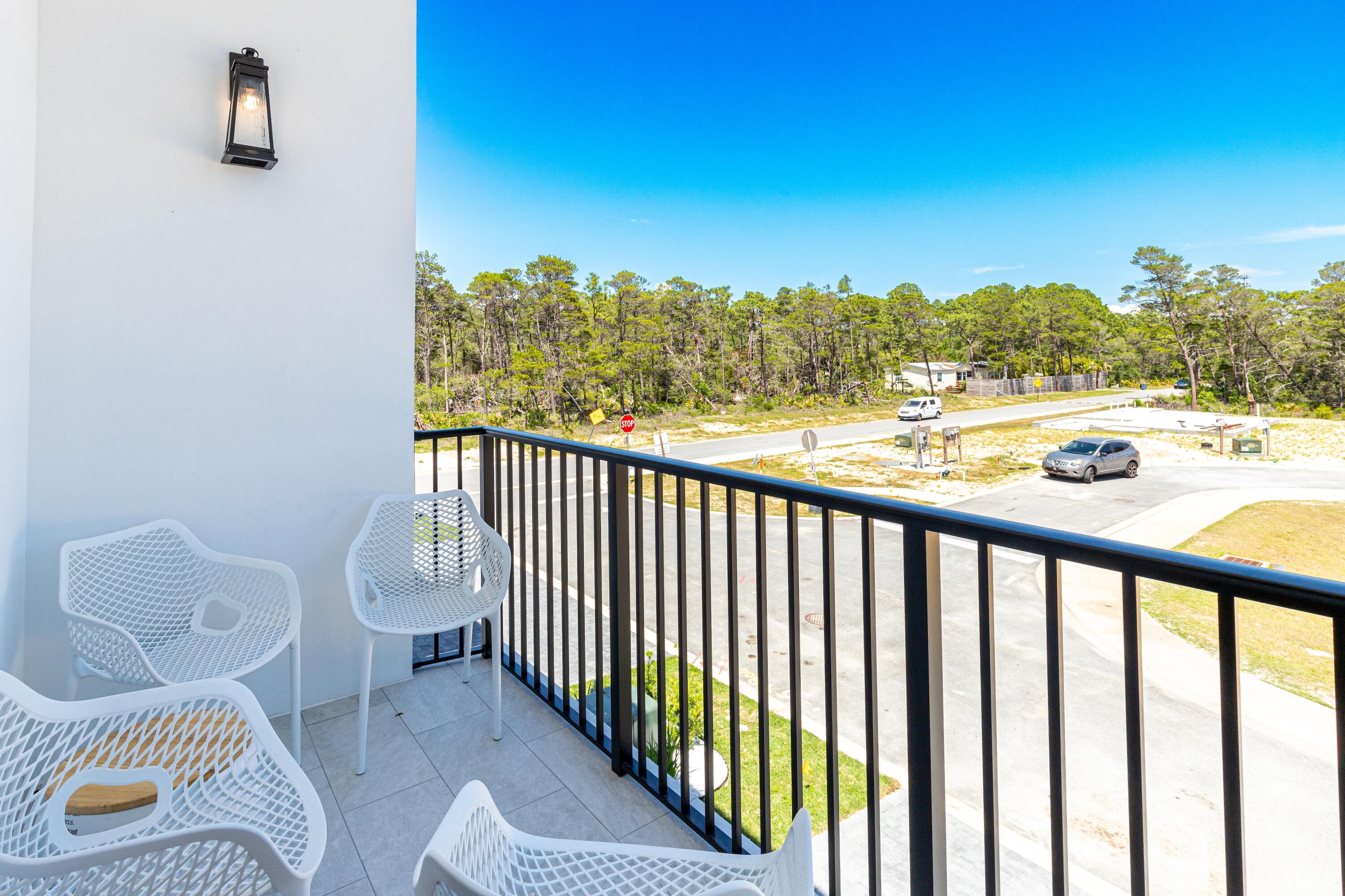 20 Sea Croft Drive Santa Rosa Beach, FL 32459 - Photo 23 of 54 a view of a balcony with furniture