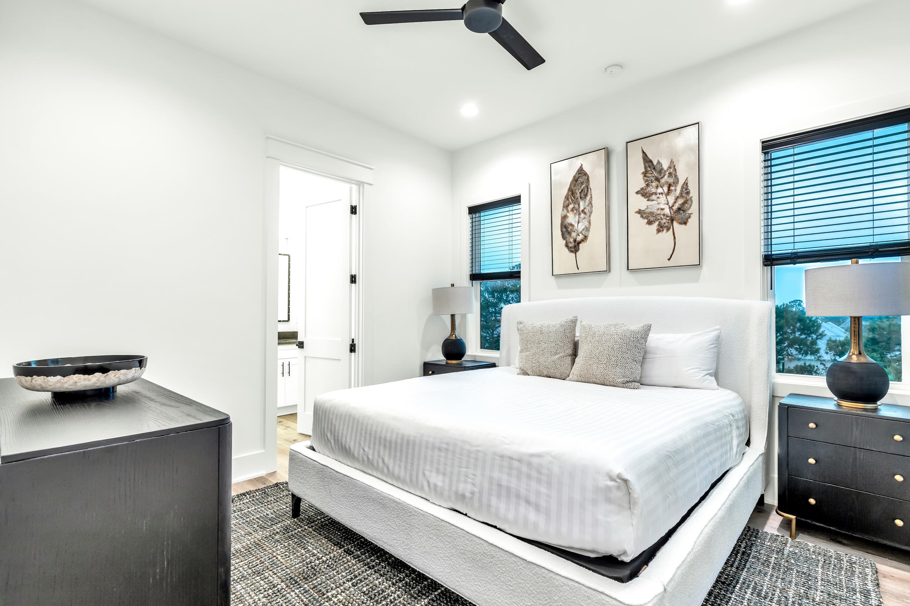 20 Sea Croft Drive Santa Rosa Beach, FL 32459 - Photo 36 of 54 a bedroom with a bed and wall painting