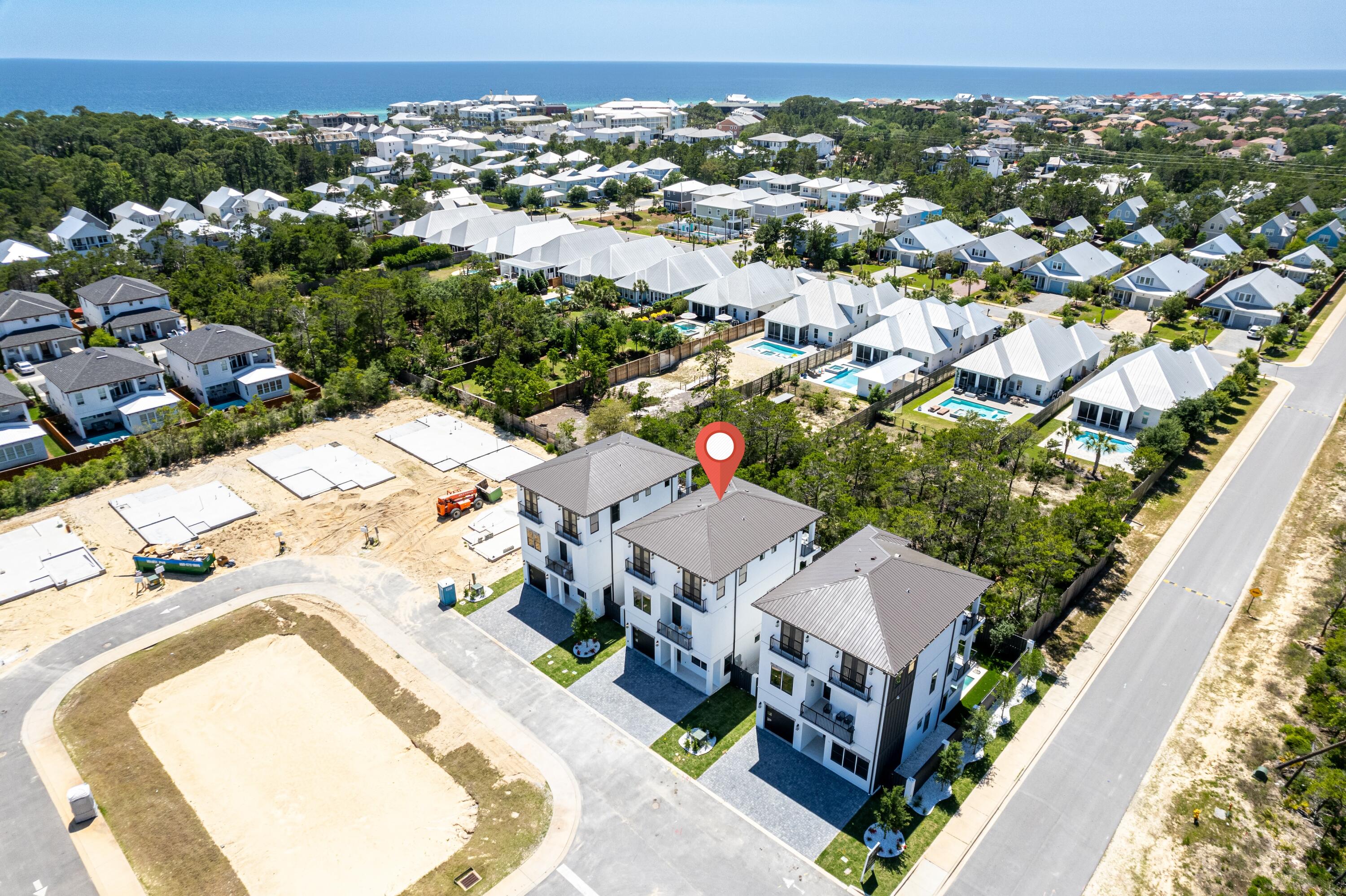 20 Sea Croft Drive Santa Rosa Beach, FL 32459 - Photo 50 of 54 an aerial view of a house with a swimming pool and lake view